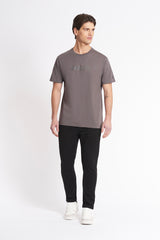 T-shirt con logo centrale tono su tono
