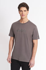 T-shirt con logo centrale tono su tono
