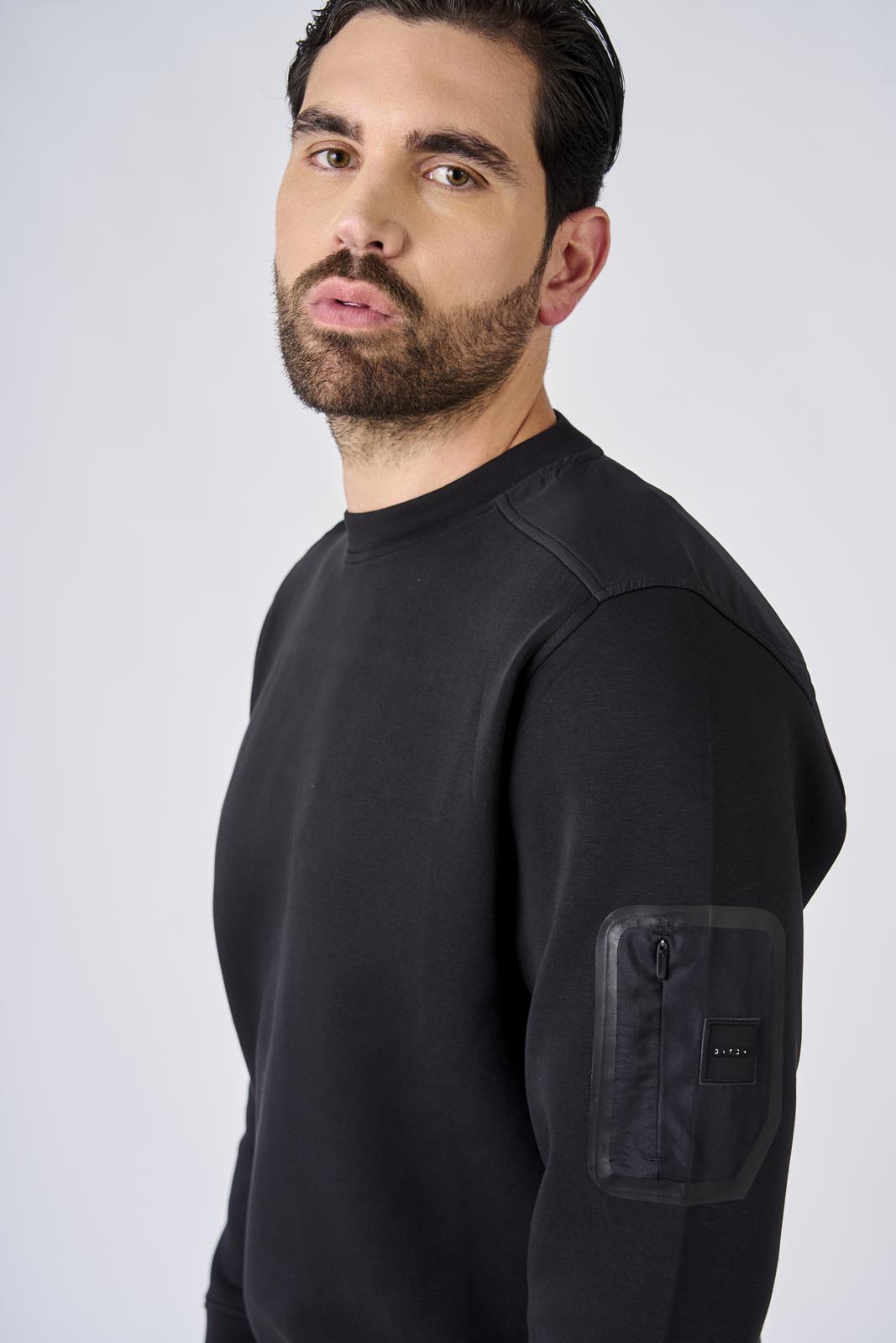 Felpa girocollo in interlock con inserti in nylon