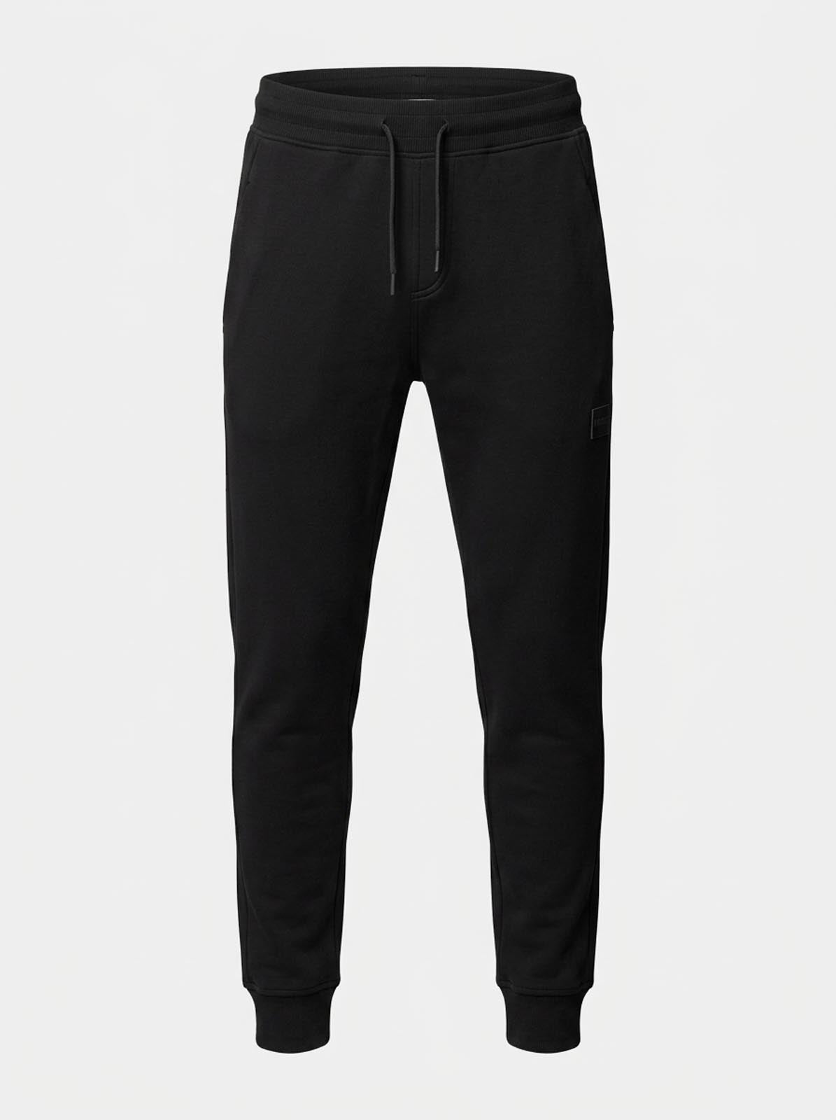 Pantaloni in felpa di interlock con patch logo