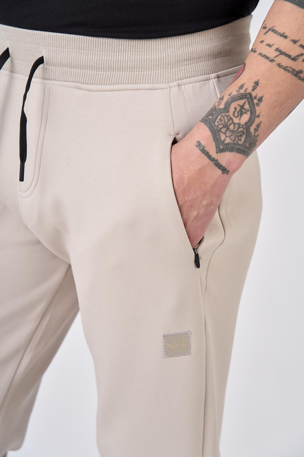 Pantaloni in felpa di interlock con patch logo