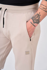 Pantaloni in felpa di interlock con patch logo