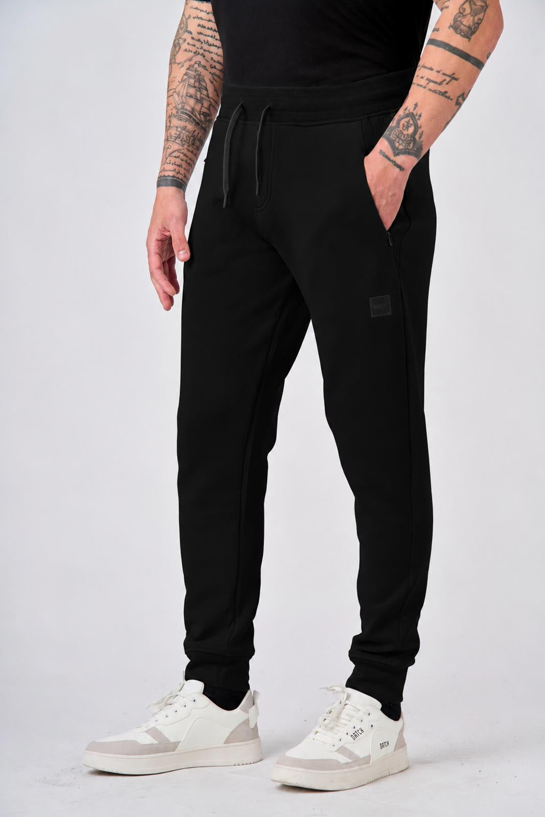 Pantaloni in felpa di interlock con patch logo