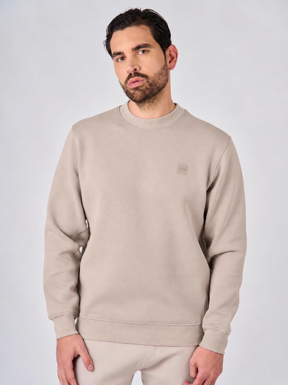 Felpa girocollo in interlock con patch logo