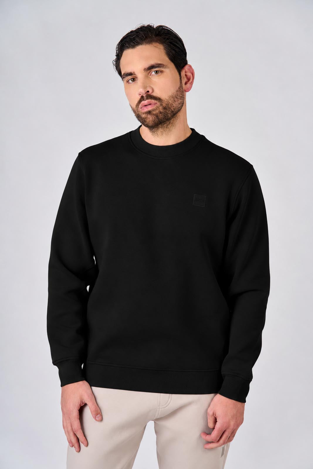 Felpa girocollo in interlock con patch logo