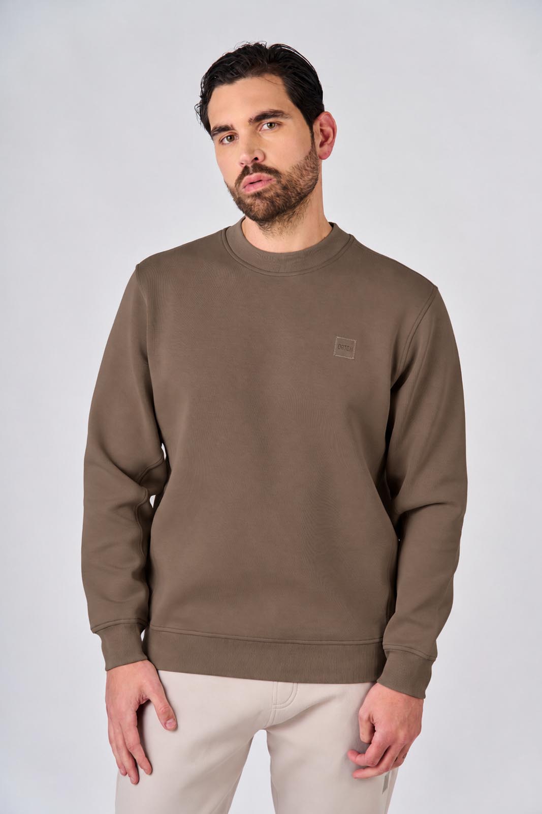Felpa girocollo in interlock con patch logo