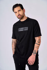 T-shirt con stampa logata