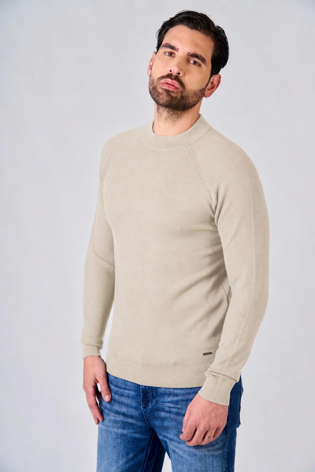 Maglia a mezzo collo manica raglan