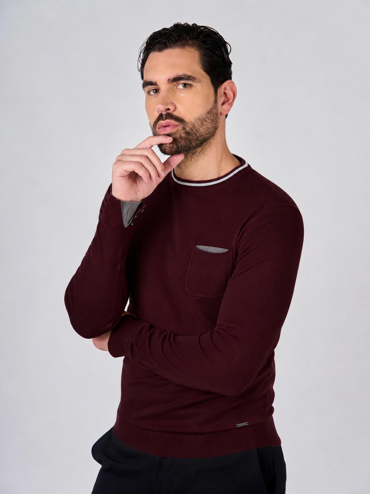 Maglia girocollo manica raglan con taschino
