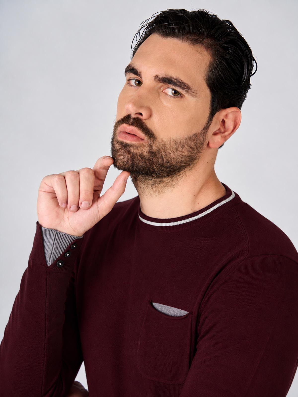 Maglia girocollo manica raglan con taschino
