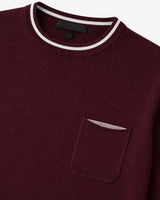Maglia girocollo manica raglan con taschino