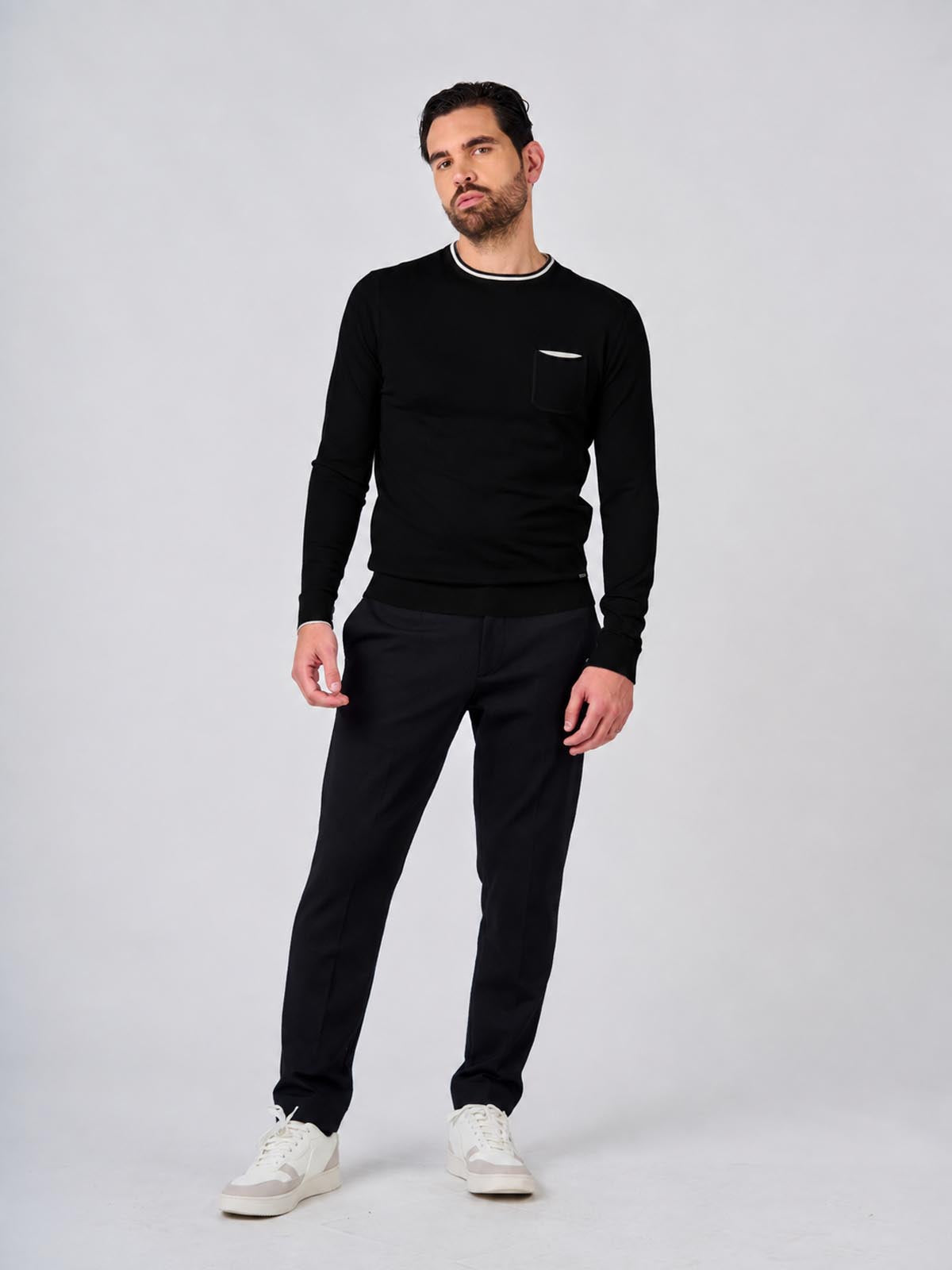 Maglia girocollo manica raglan con taschino