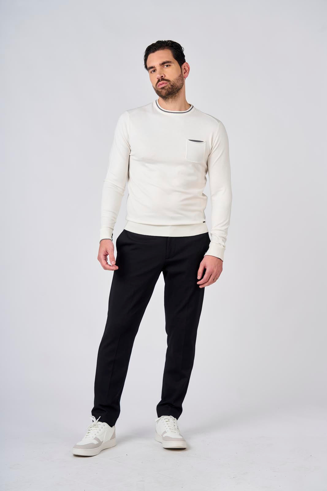 Maglia girocollo manica raglan con taschino