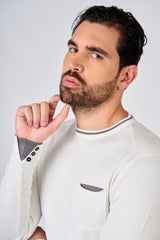 Maglia girocollo manica raglan con taschino