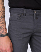 Pantaloni slim fit tinto in capo