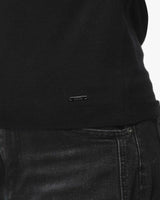 Maglia girocollo con collo a costine