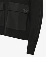 Maglia con zip e tasconi