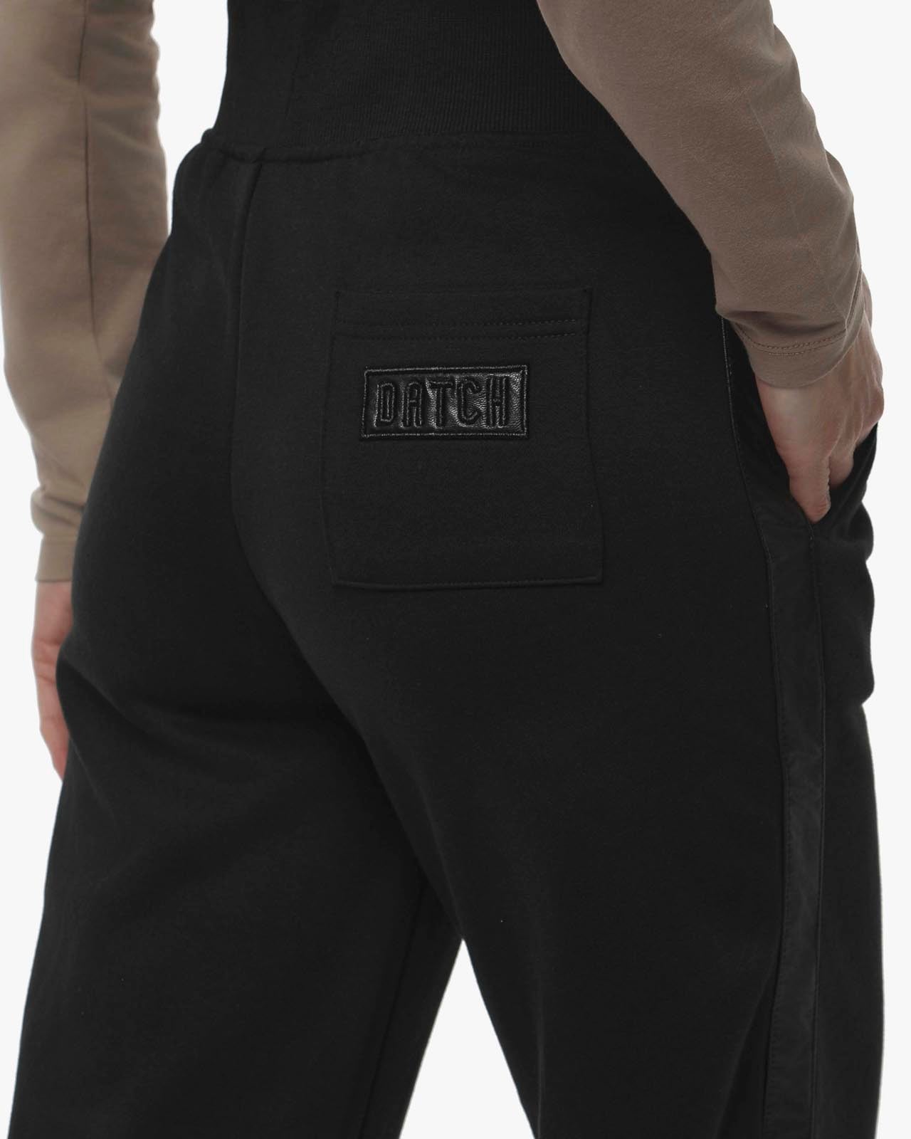 Pantaloni a gamba larga in felpa con banda in ecopelle