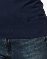 Maglia con collo polo e applicazione logo