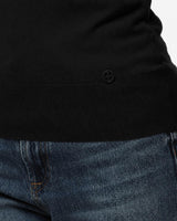Maglia con collo polo e applicazione logo