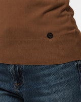 Maglia con collo polo e applicazione logo