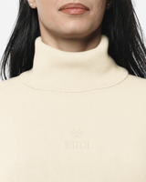 Abito in maglia a collo alto con strass