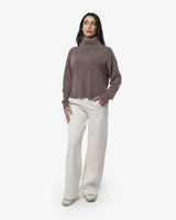 Maglia a collo alto a maniche lunghe con strass