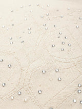 Maglia girocollo con strass e logo jacquard