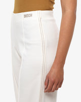 Pantaloni con strass taglio over in cotone stretch