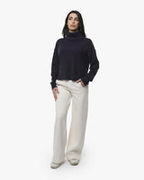 Maglia a collo alto a maniche lunghe con strass