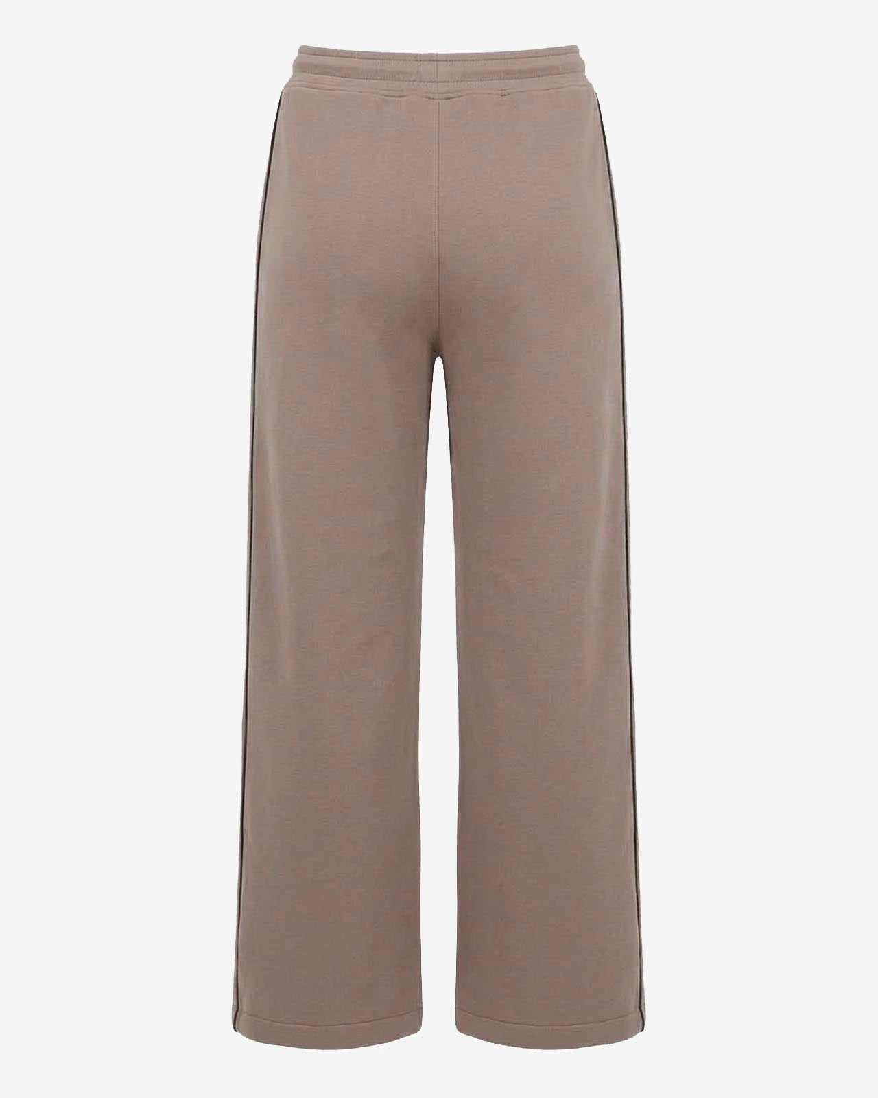Pantaloni a gamba larga in scuba con piping in ecopelle
