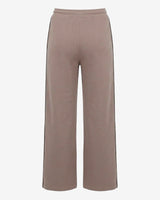 Pantaloni a gamba larga in scuba con piping in ecopelle