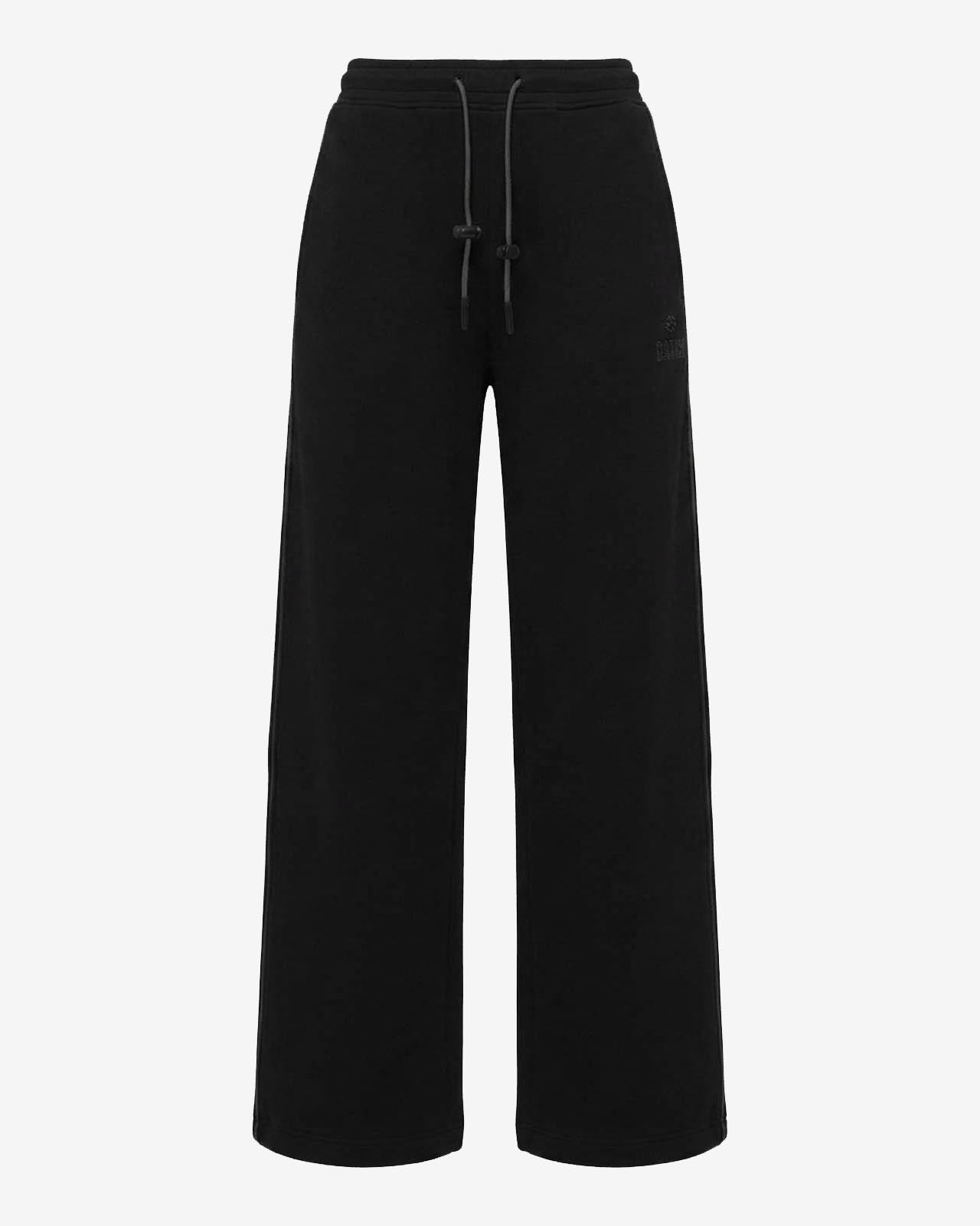 Pantaloni a gamba larga in scuba con piping in ecopelle