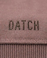 Maglia con scollo asimmetrico e strass