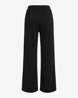 Pantaloni a gamba larga in scuba con piping in ecopelle